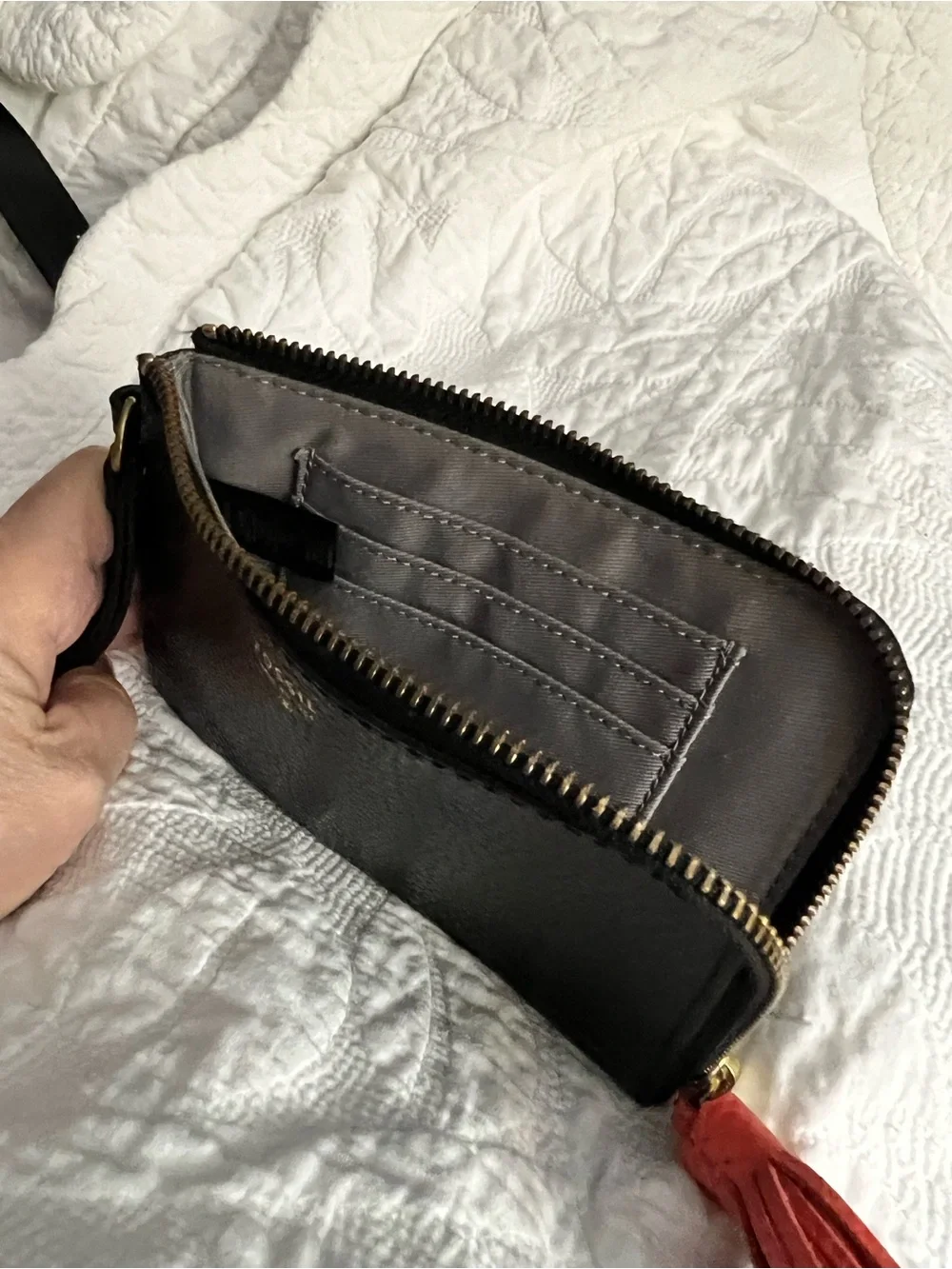 Fossil Black Leather Wristlet with Coral Tassel Accent